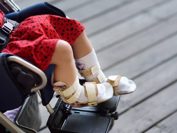 Give 6-year-old Aisha the gift of a wheelchair