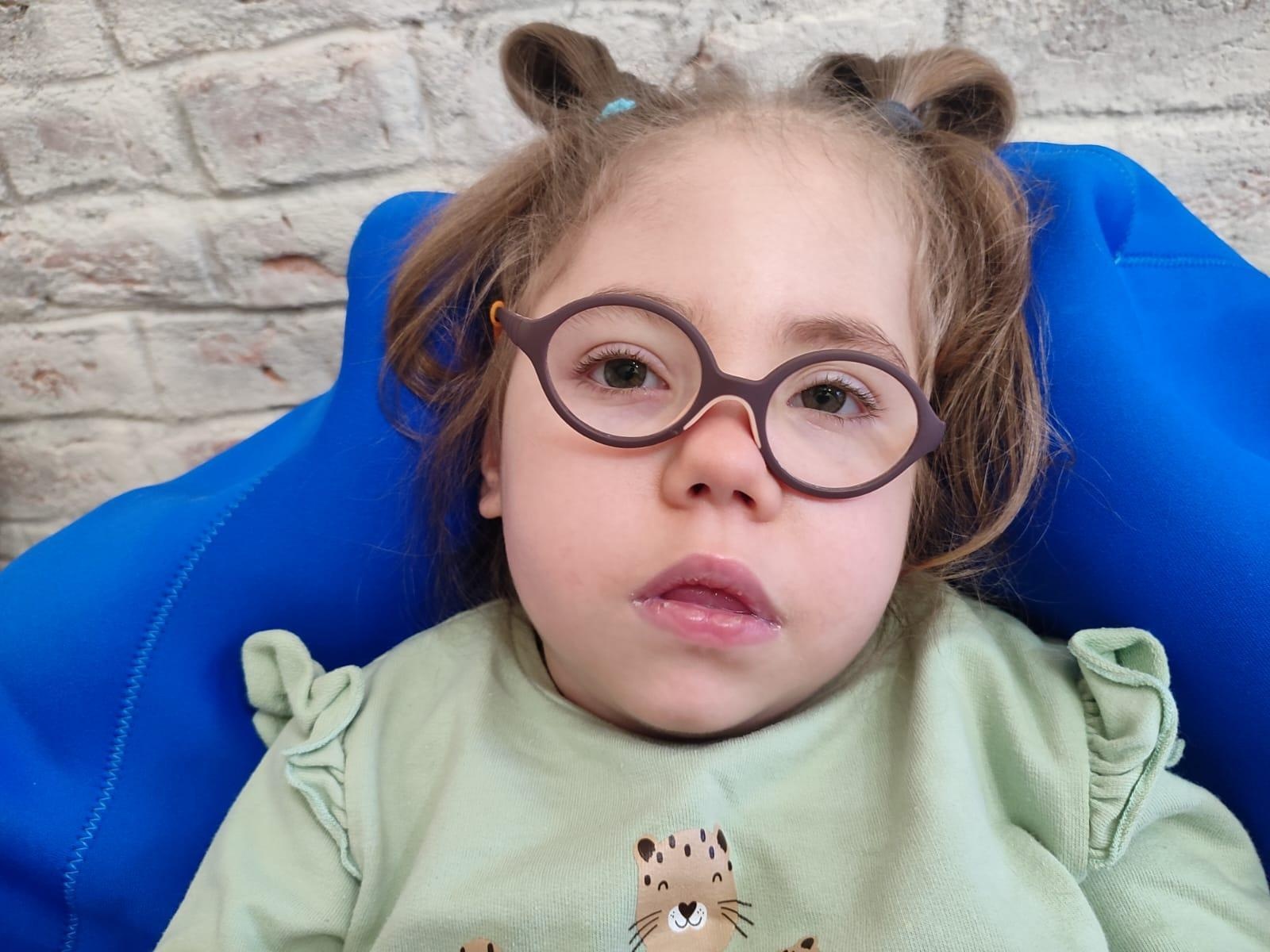 Sasha uses a wheelchair and needs a lifting device to get out of the house