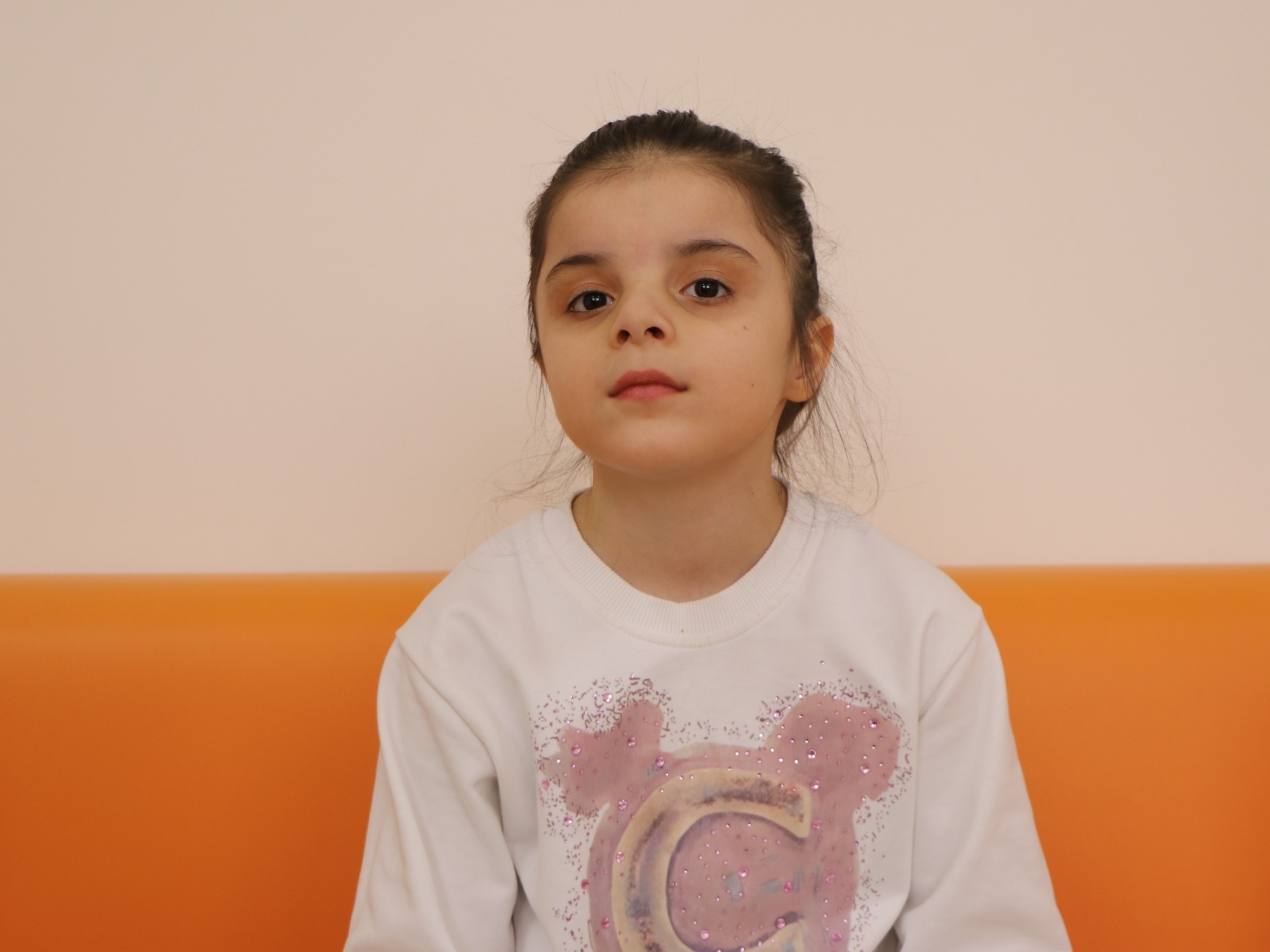 Help Aisha overcome her developmental delay and move forward