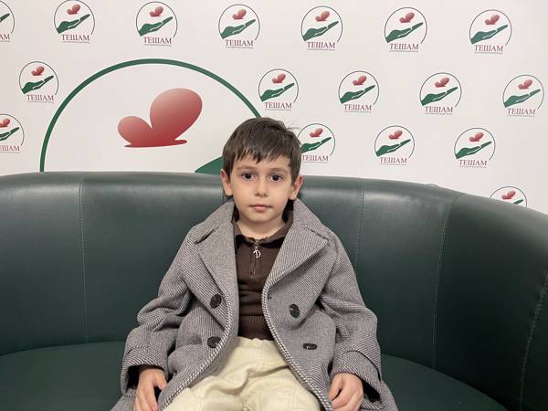 Khamzat has developmental delay and autism spectrum disorder. He needs rehabilitation.