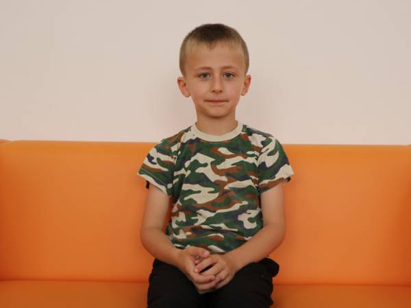 Mukhammad has developmental delay and diplegia; he needs rehabilitation.