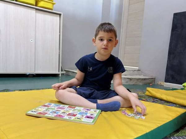To improve his communication skills, Mukhammad needs to take an autism correction course!