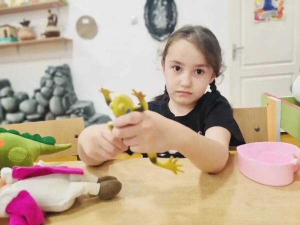 Esmira has been diagnosed with autism with intellectual disability and delayed speech and psychoverbal development. She needs rehabilitation to overcome developmental delays.
