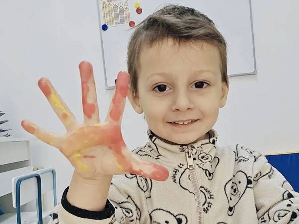 Akhmed has a developmental speech delay, and he needs rehabilitation to overcome this delay.
