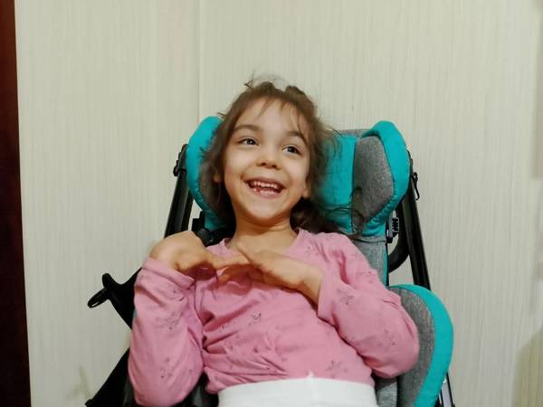 Alisa and other children with cerebral palsy need positioning pillows to avoid experiencing pain!