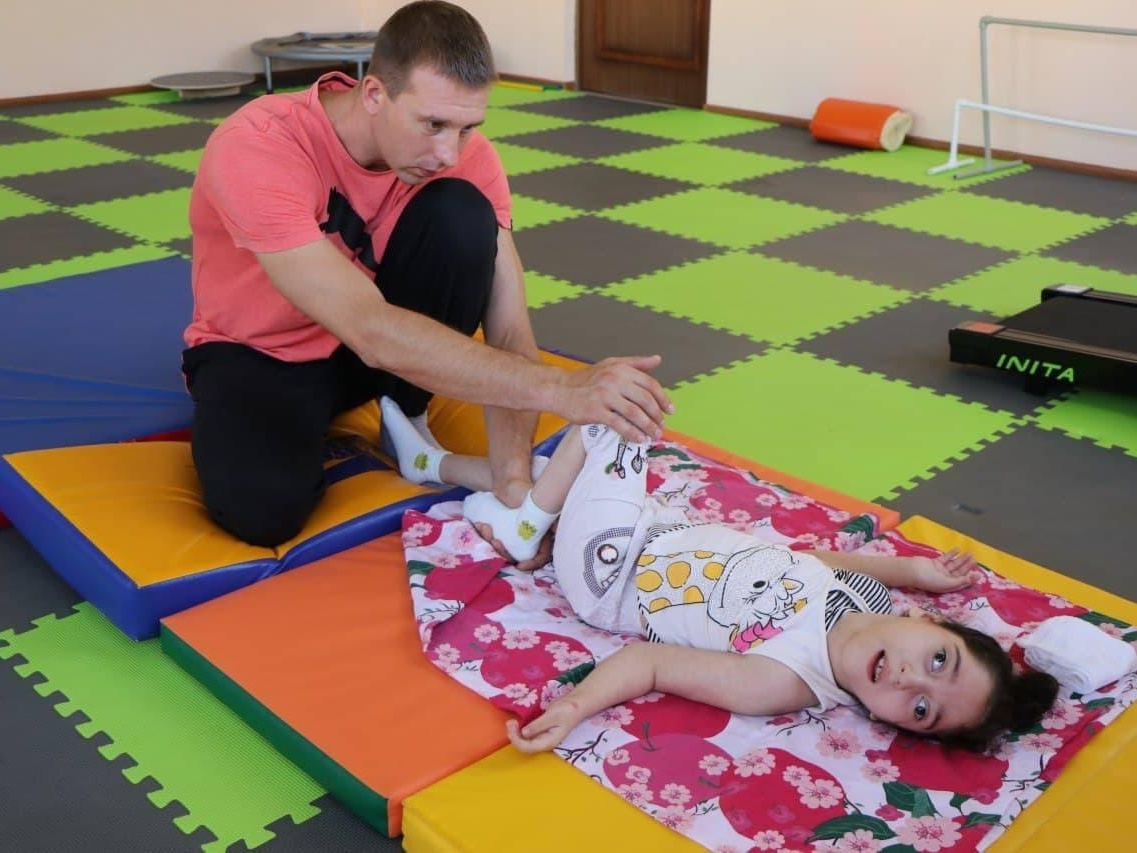 Madina has cerebral palsy and needs another course of rehabilitation