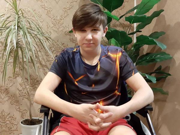 Ruslan has congenital bone brittleness and needs an operation to restore his ability to walk