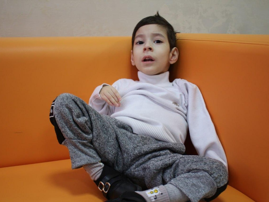 Muhammad has cerebral palsy. He needs rehabilitation to improve his speech and motor functions!