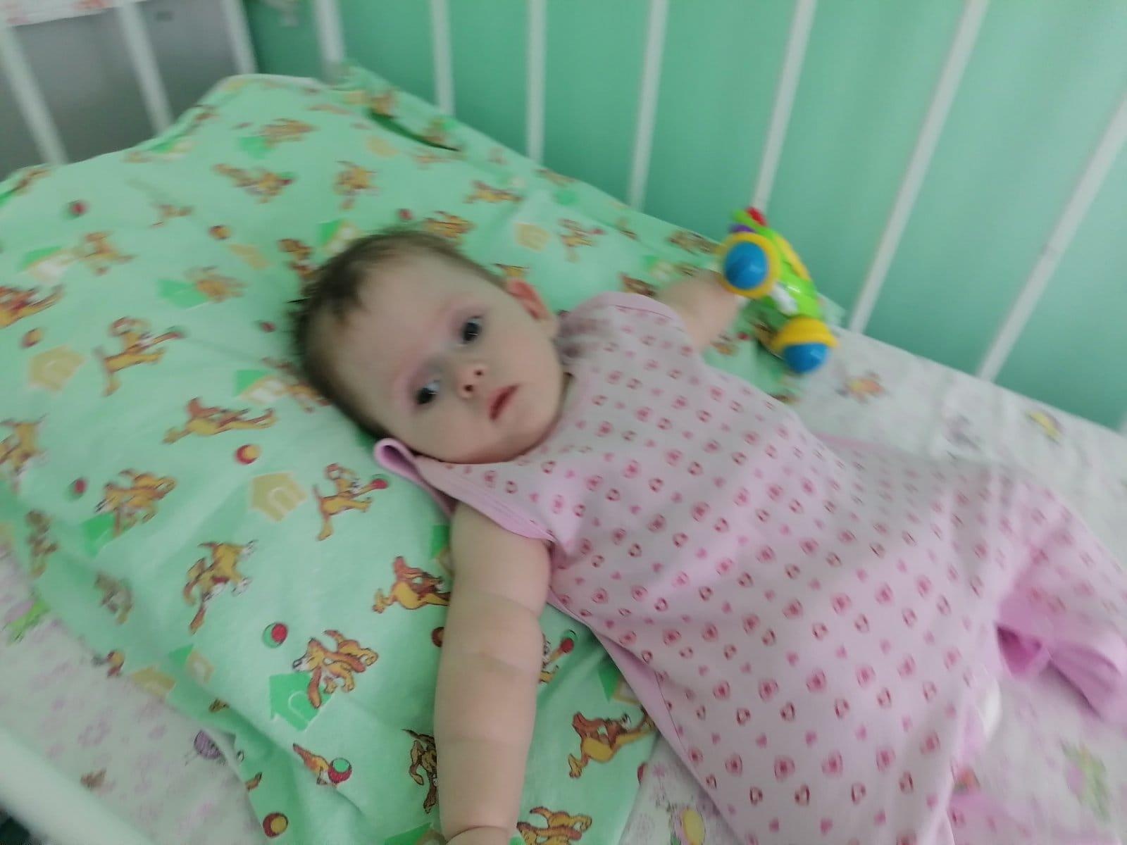 Lena is an orphan. The baby needs to be accompanied by a babysitter during treatment in the hospital!