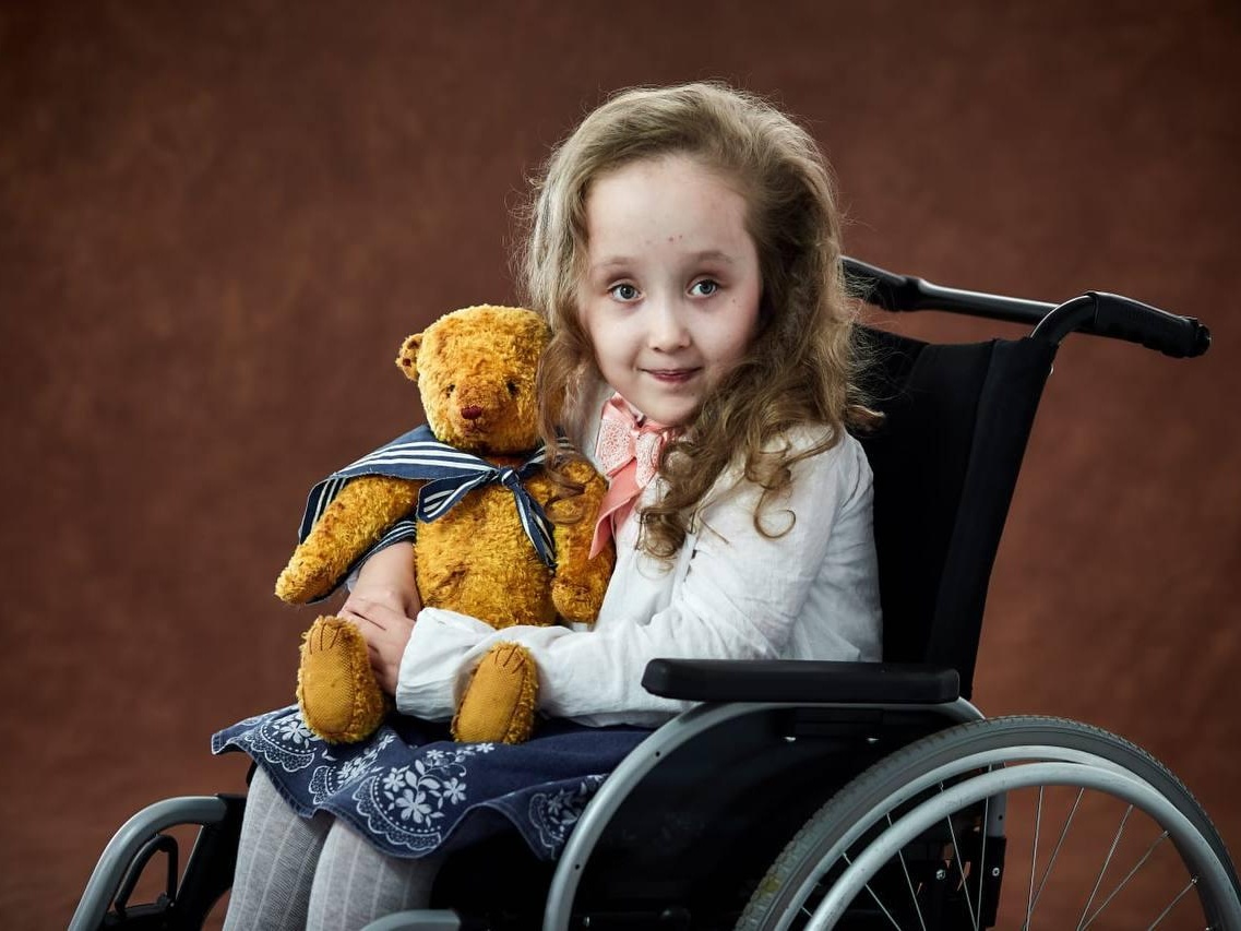 Nastia has spina bifida and needs wheels and skis for her wheelchair!