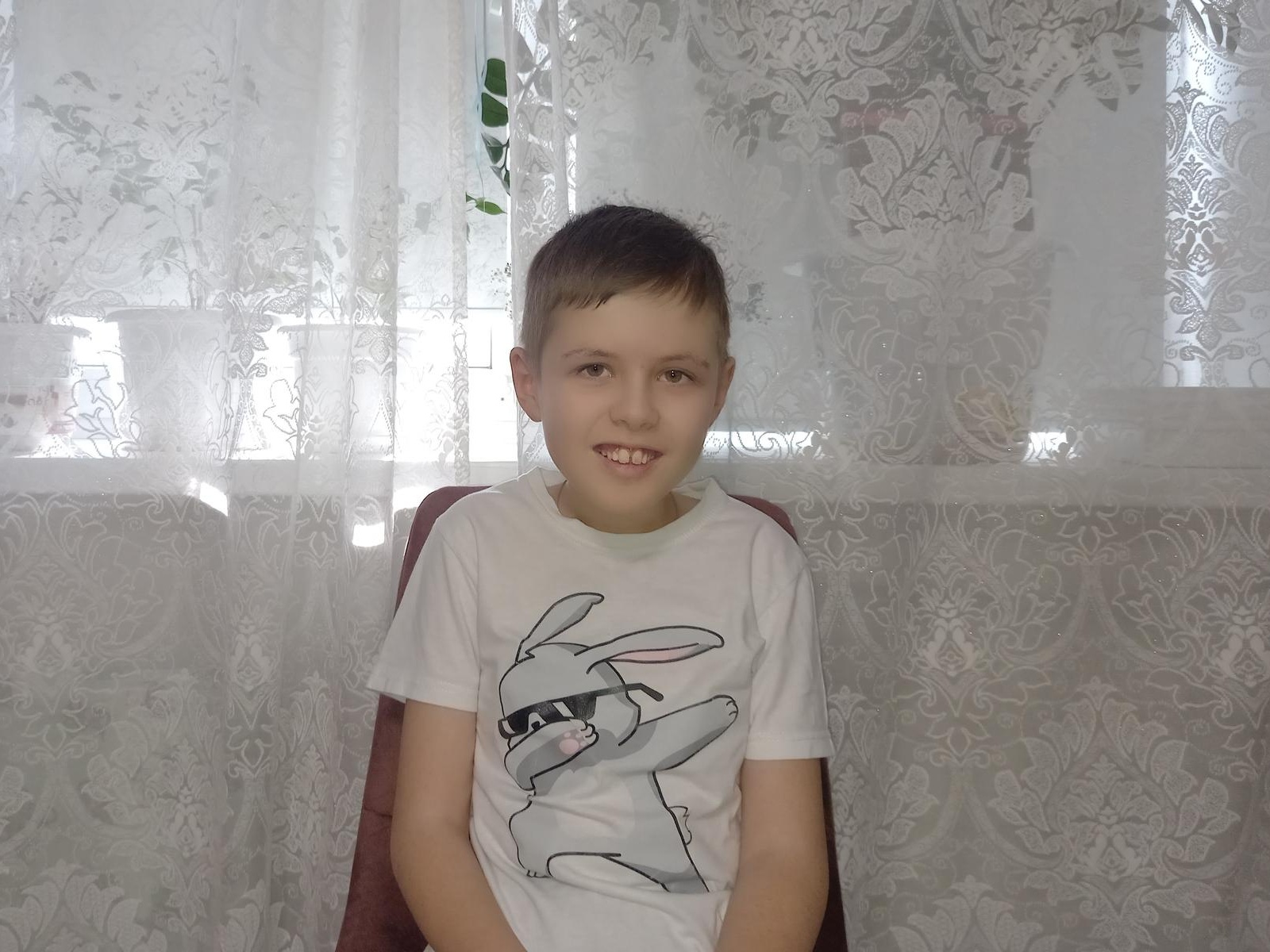 Matvey needs a special wheelchair to move comfortably at school and at home