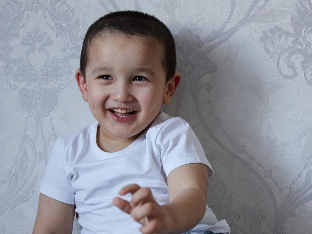 Firdavs has cerebral palsy. He needs surgery on his spine to start walking