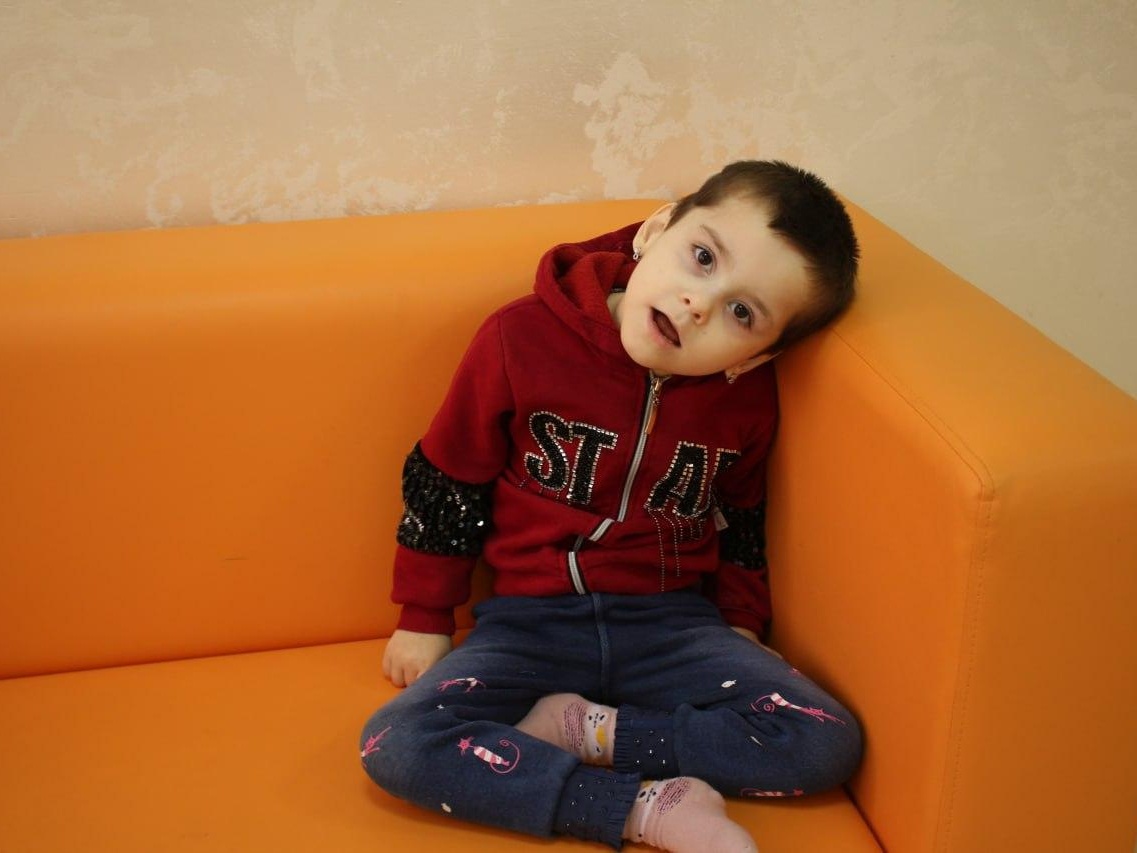 Zaloban has cerebral palsy. She needs rehabilitation to develop her speech skills and to learn to sit up without support!