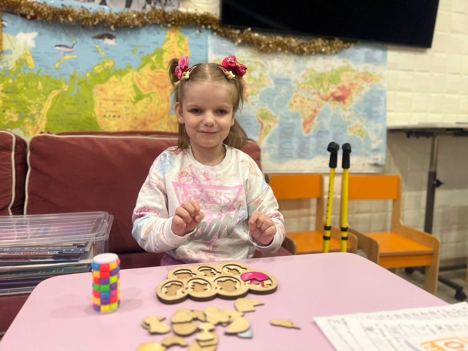 Polina has cerebral palsy. She needs leg braces  to learn to walk independently