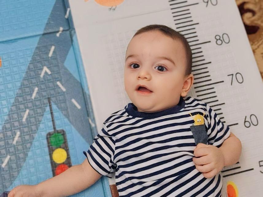 Abdurakhman has cerebral palsy. To learn how to crawl, he needs to undergo rehabilitation!