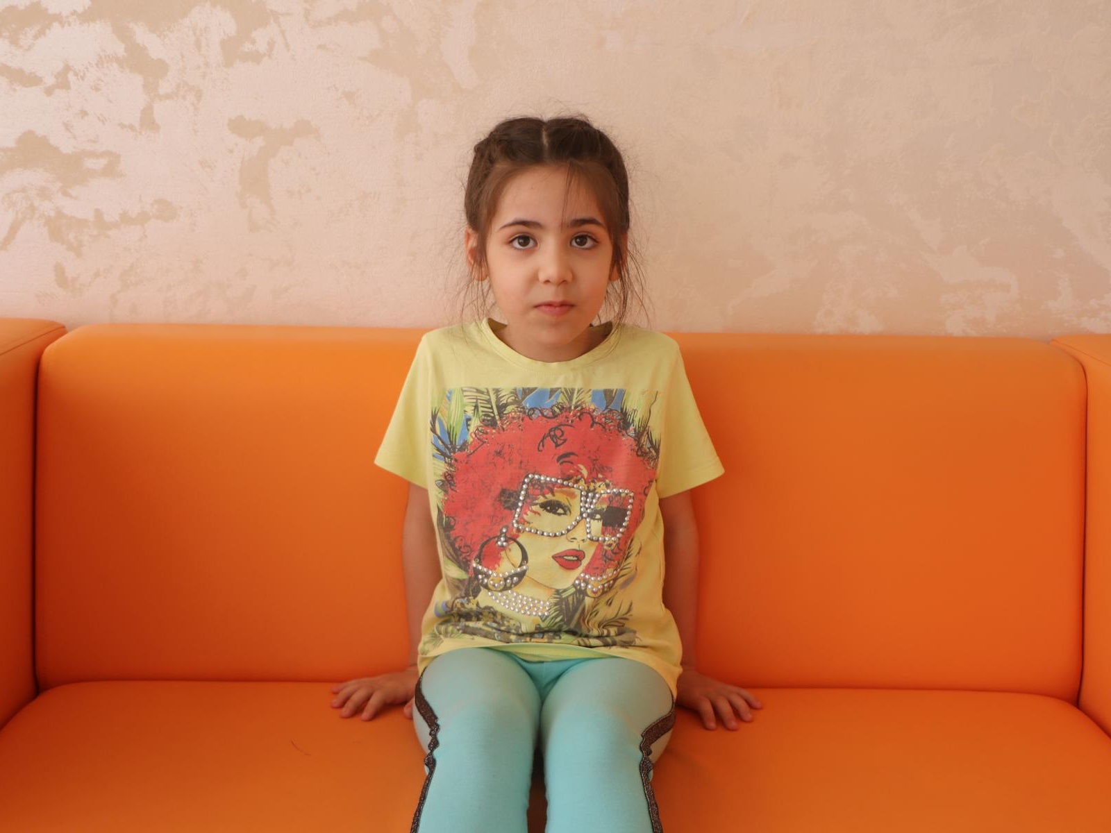 Aliya needs rehabilitation therapy to learn to talk and interact with others!