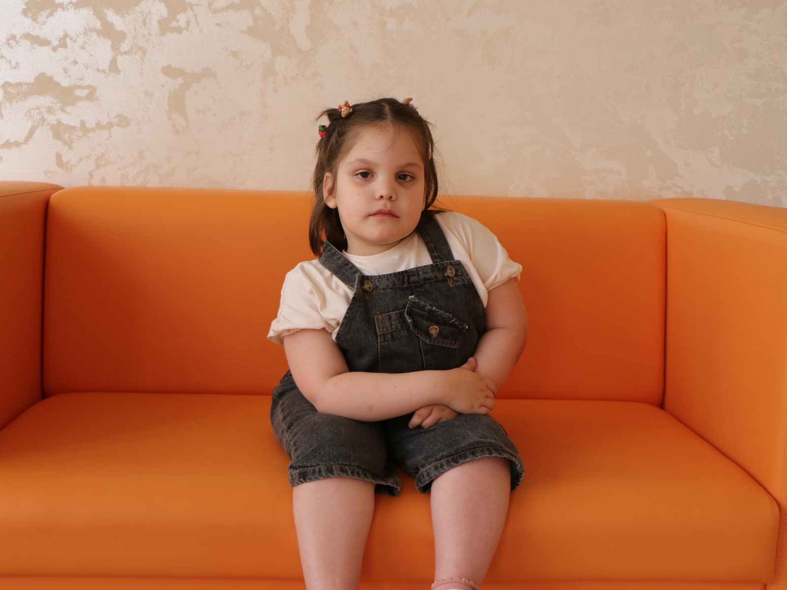 Amina has Spina Bifida. She needs to pay for accommodation in another city while the child undergoes a rehabilitation course