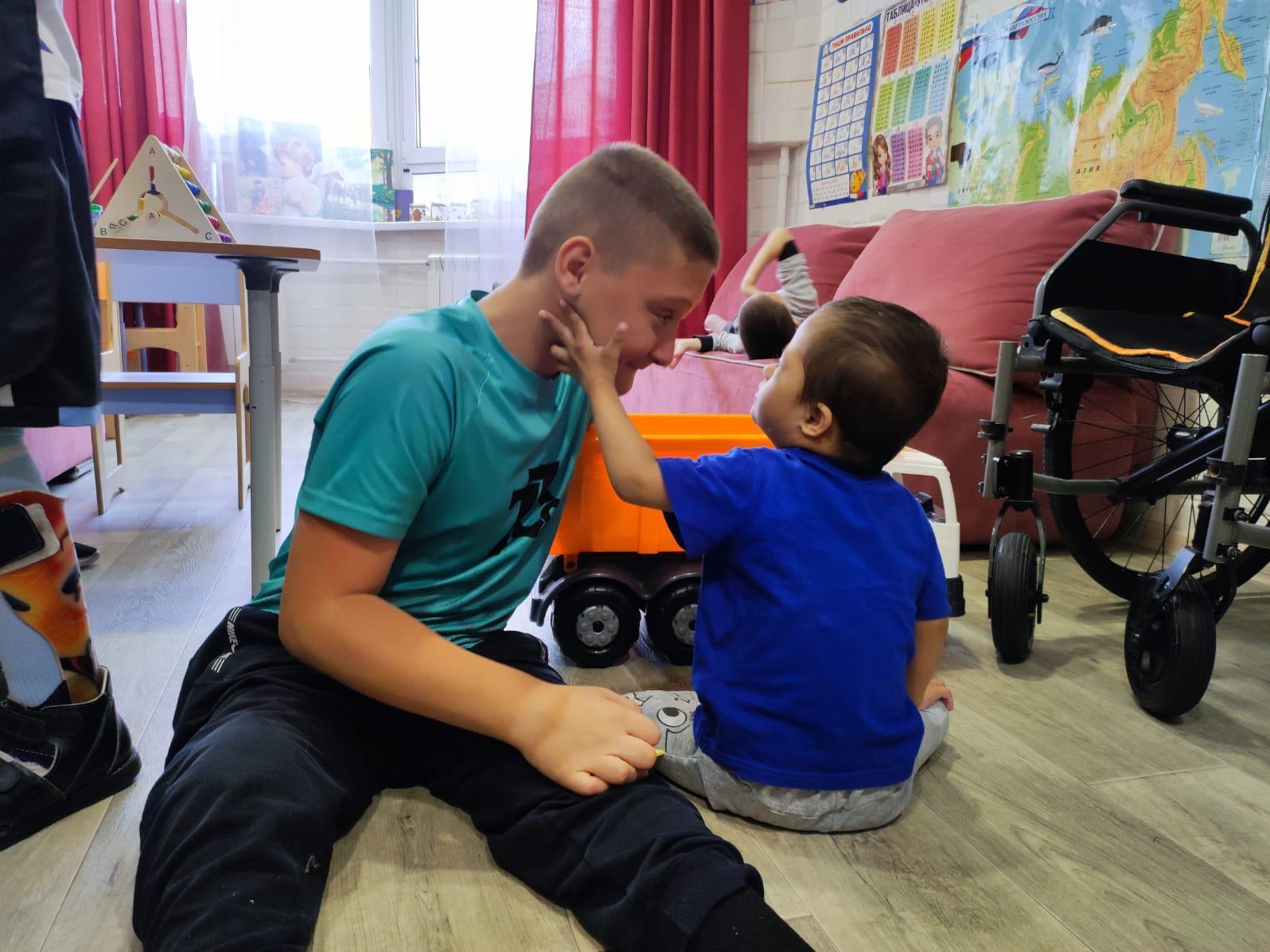 Baby Kolia and other orphaned children with serious illnesses need the support of nannies during their treatment