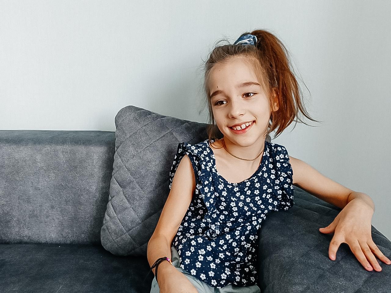 Eva needs support to stand to maintain her health and develop walking skills!