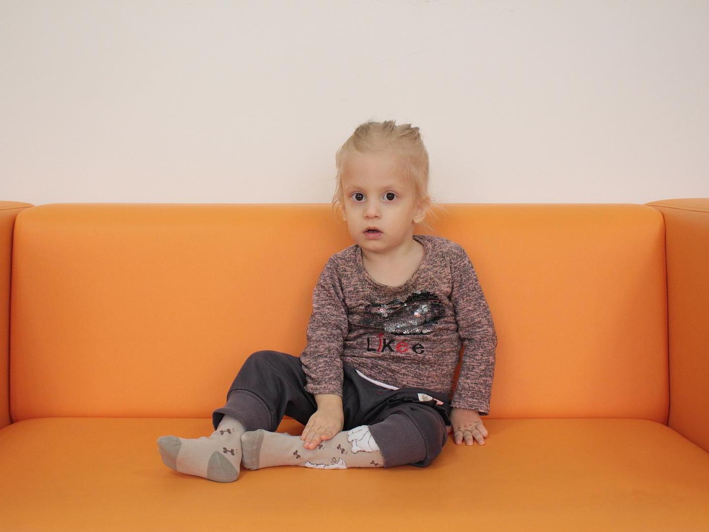 Aisha needs rehabilitation therapy to learn to walk and talk