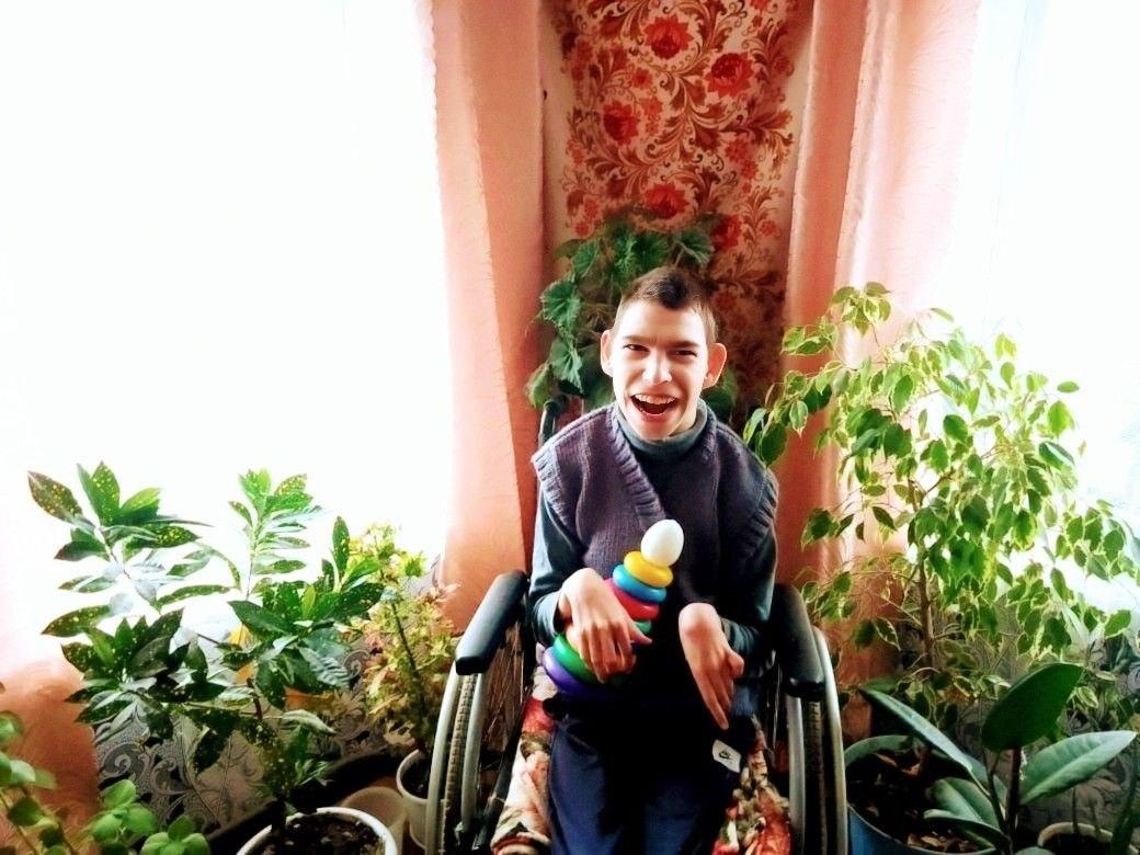 Sergey needs a power wheelchair to move around without assistance