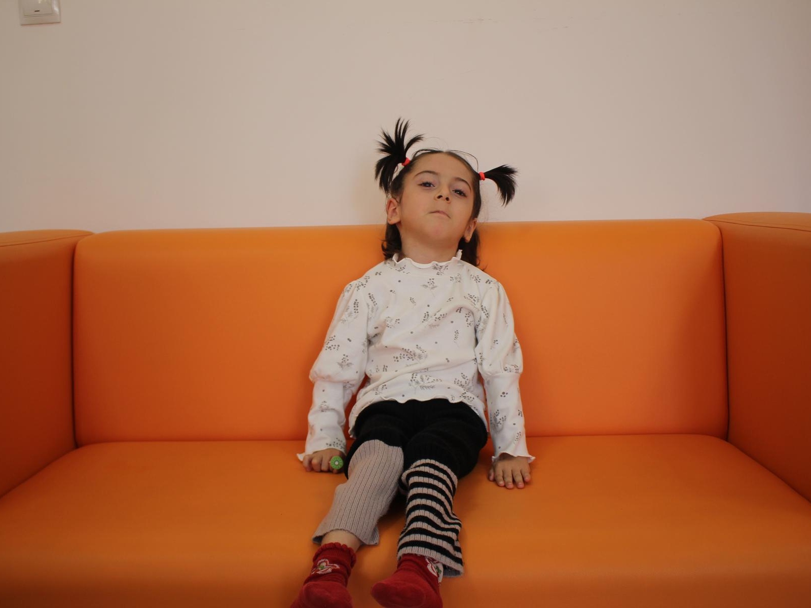 Aisha has cerebral palsy. She needs rehabilitation to develop her speech and walking skills!