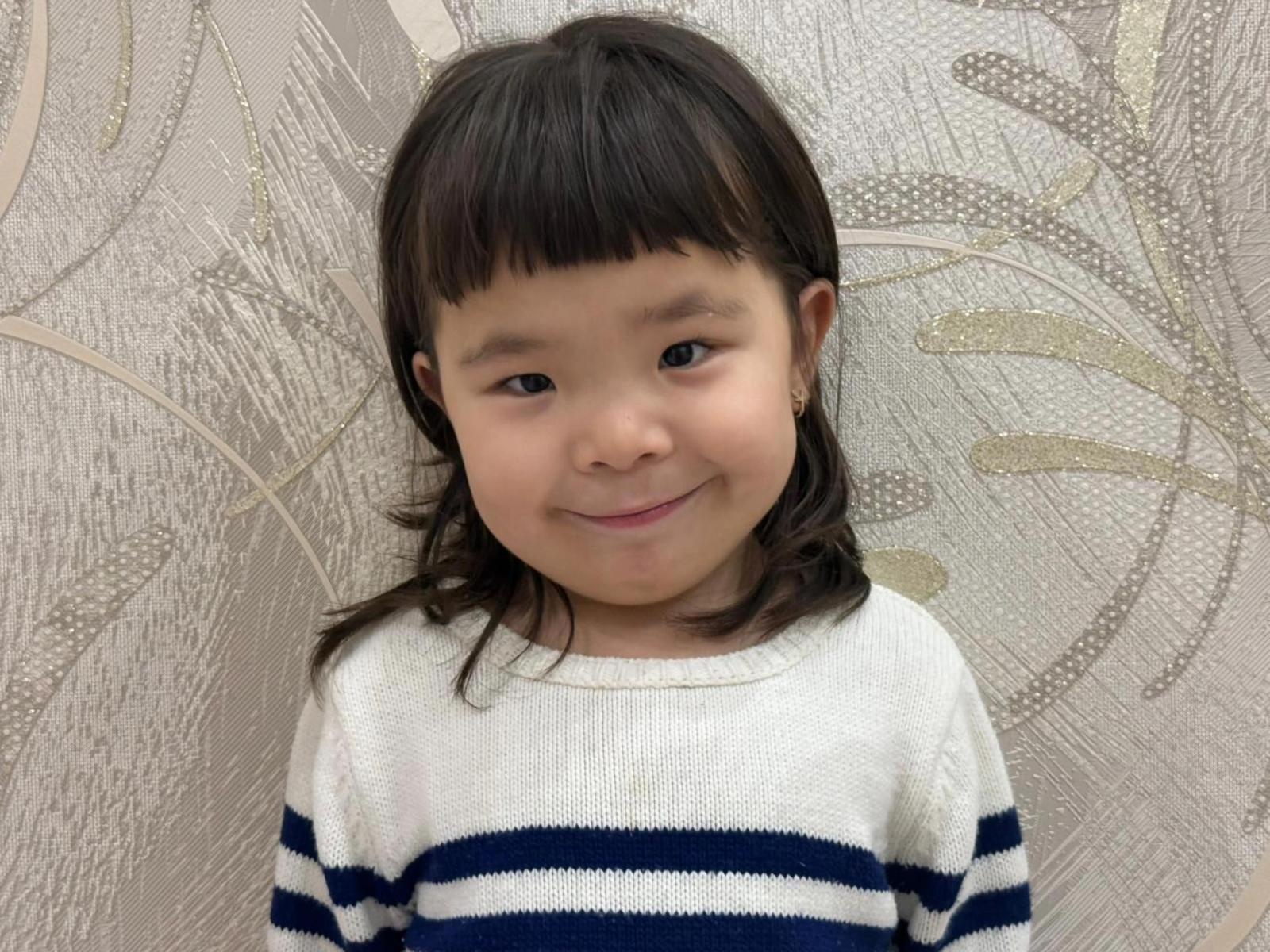 Ayim has cataracts and needs surgery to restore her eyesight